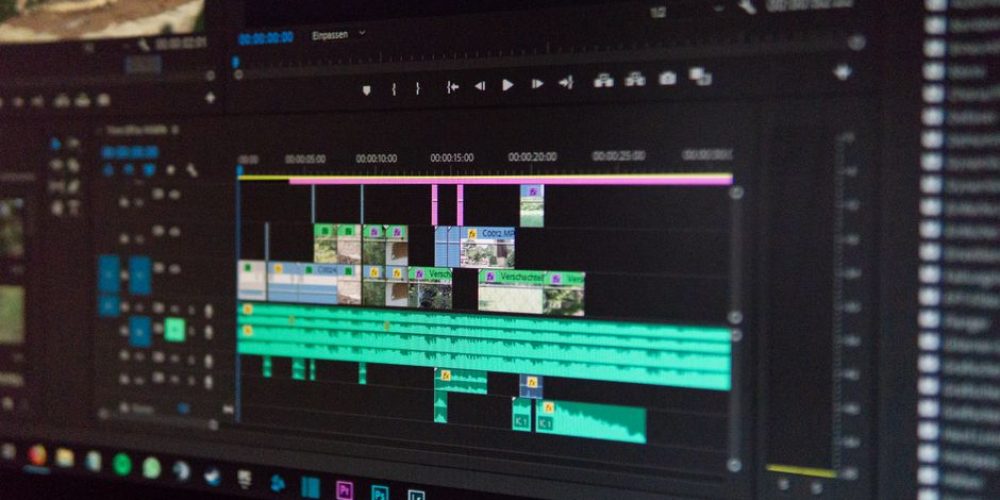 New Orleans video production company editor using AI-enhanced post-production workflow in 2026 edit bay