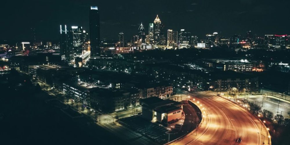 Atlanta video production company Tone Production filming cinematic 8K brand video with FAA-certified drone over Atlanta skyline