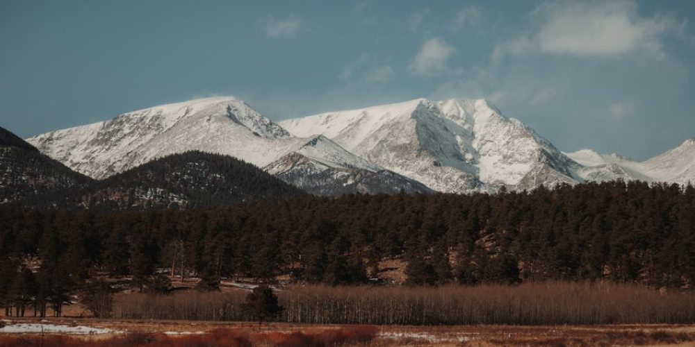 Denver videographers filming outdoor brand video at altitude with Rocky Mountain backdrop
