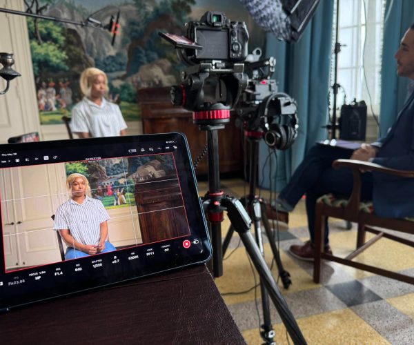 Benjamin Tone of Tone Production in a Tampa post production color grading suite — DaVinci Resolve professional color grading and multi-format final delivery for a Tampa Bay corporate brand film at the Tampa Bay Production Authority standard