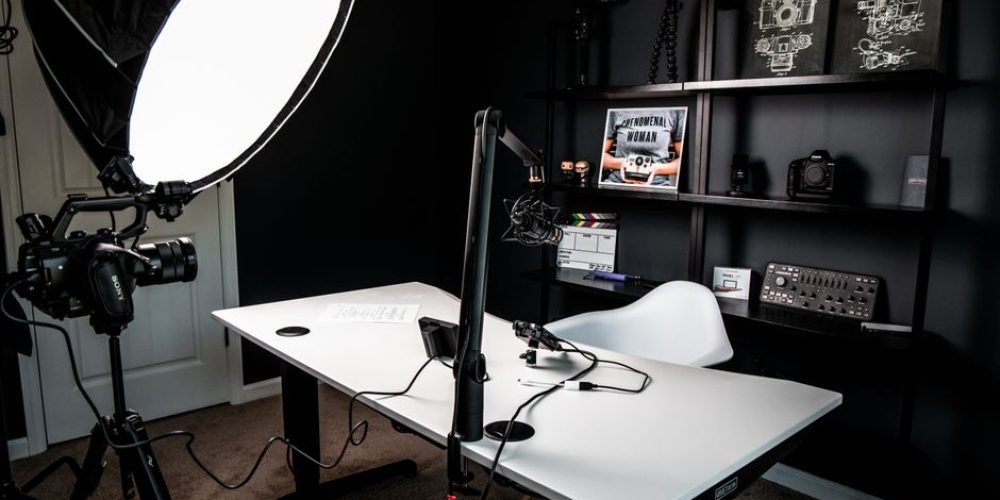 In-office product video setup showing how to film a product video on a budget with a camera, softbox light, and clean backdrop