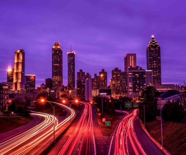 professional camera crew from Tone Production filming a high-end corporate video in downtown Atlanta