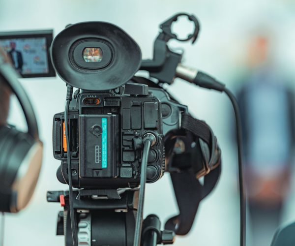 TV Camera Recording a Publicity Event