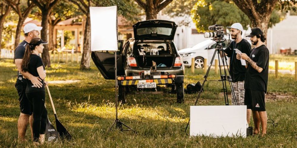 Filmmaker reviewing footage on a monitor to avoid common video production mistakes on set